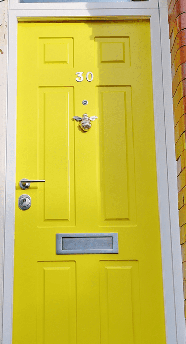 Yellow Security Doors with Bumble Bee Knocker Knights Mark