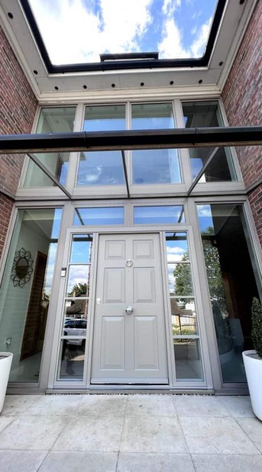 Security Door in Light Grey With Divided Sidelights