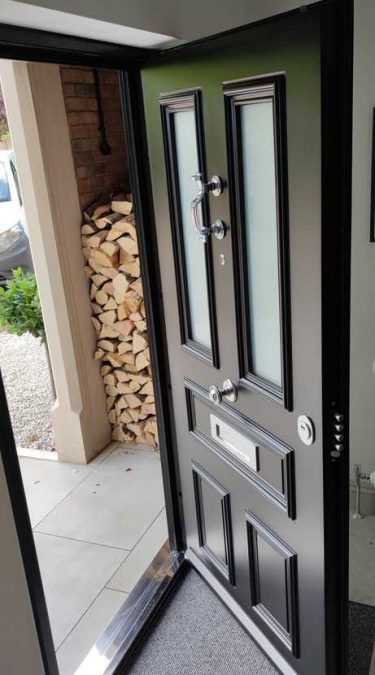 Security Door in Black with Bolts