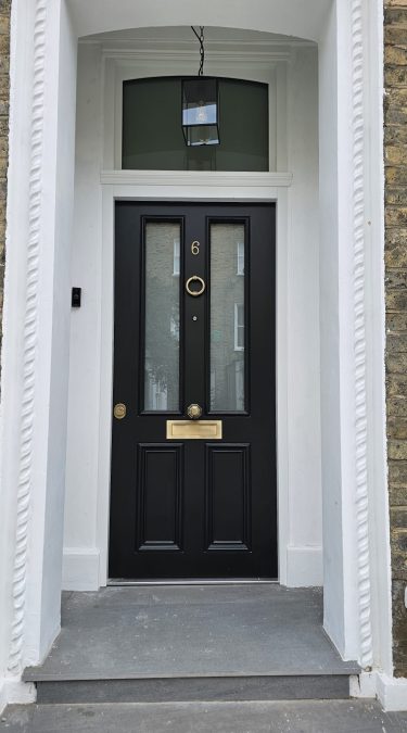 Security Doors with Detailed Architrave and Satin Glass
